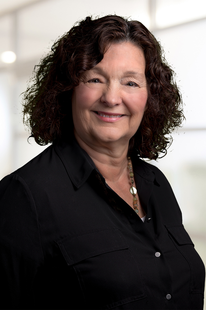 Portrait of Lorie Johnson, REALTOR®.